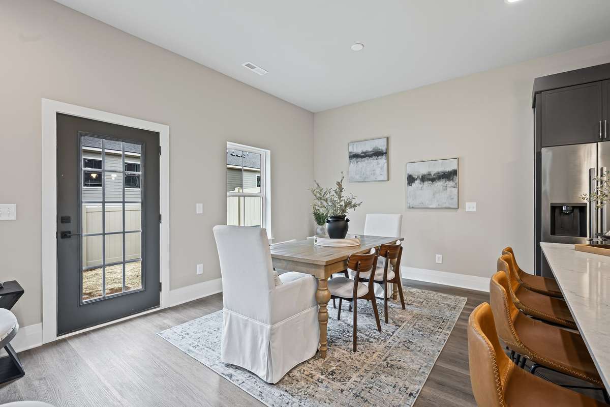 Dining Area with Natural Light from Backyard.