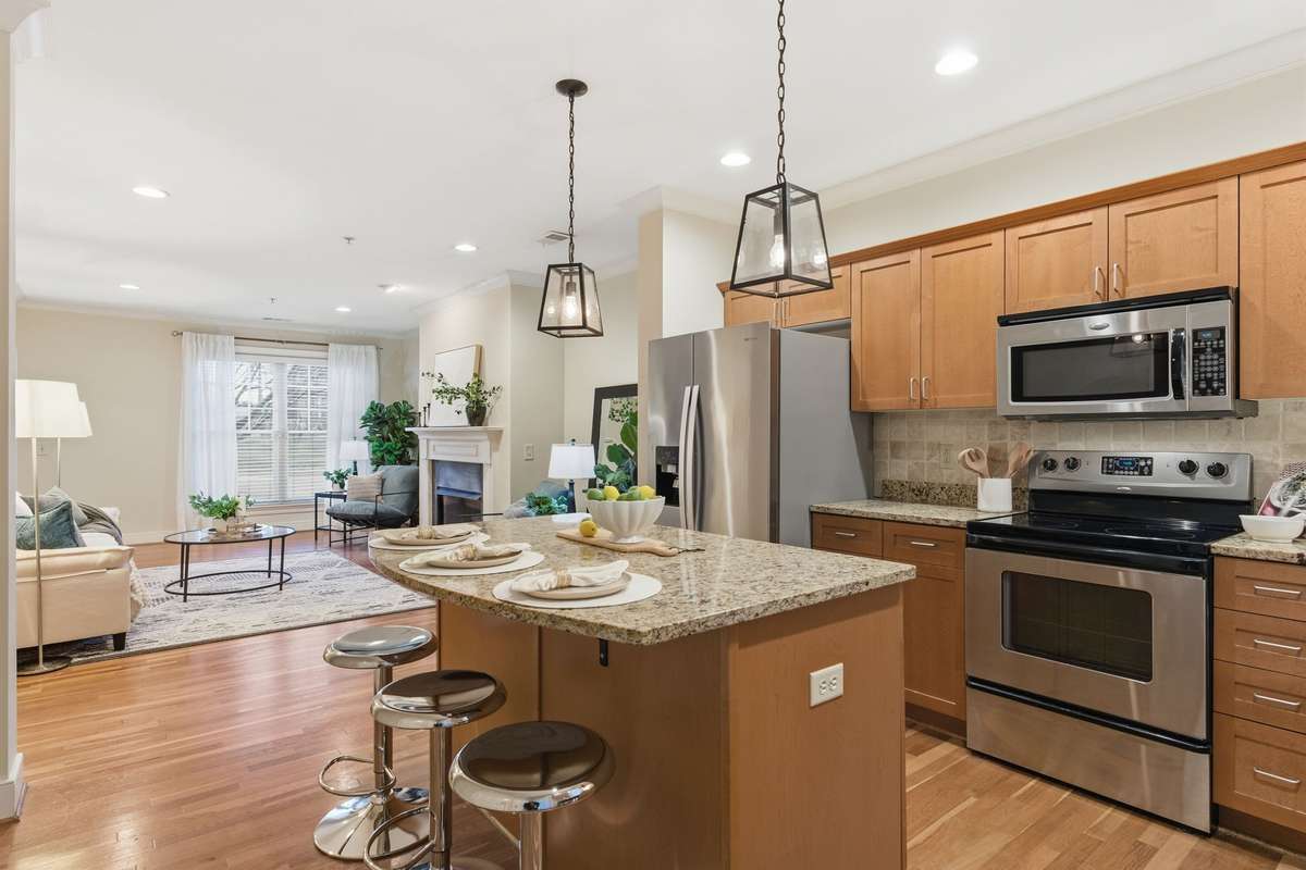 Kitchen Island and Stainless Steel Appliances