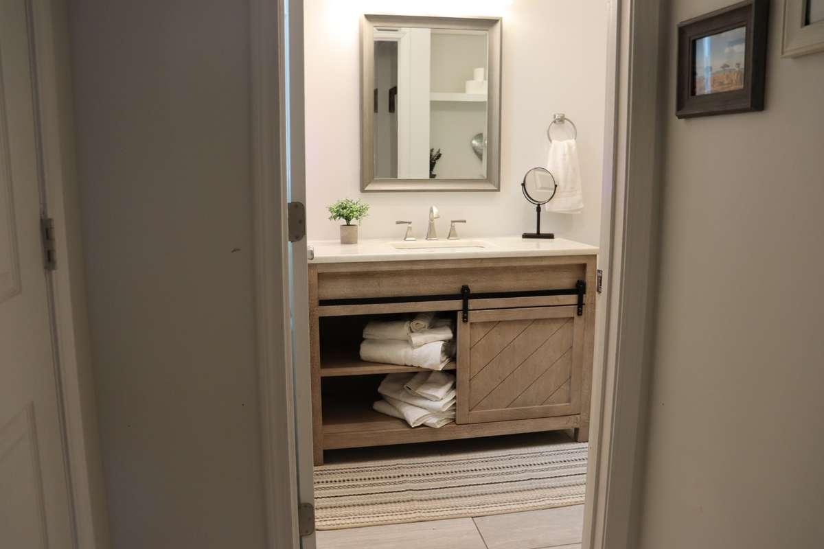 Your bathroom vanity provides plenty of storage for towels and toiletries.