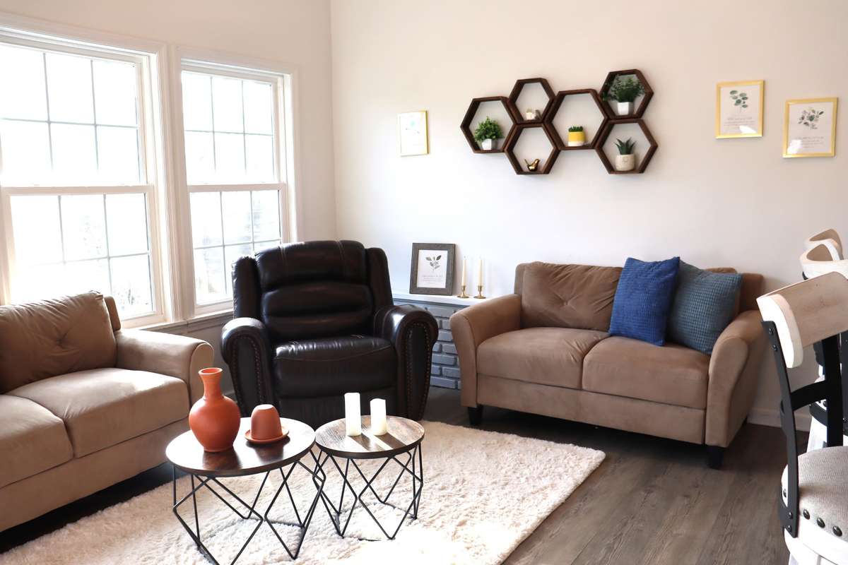 Natural lighting from the large picture windows brings the outdoors inside.