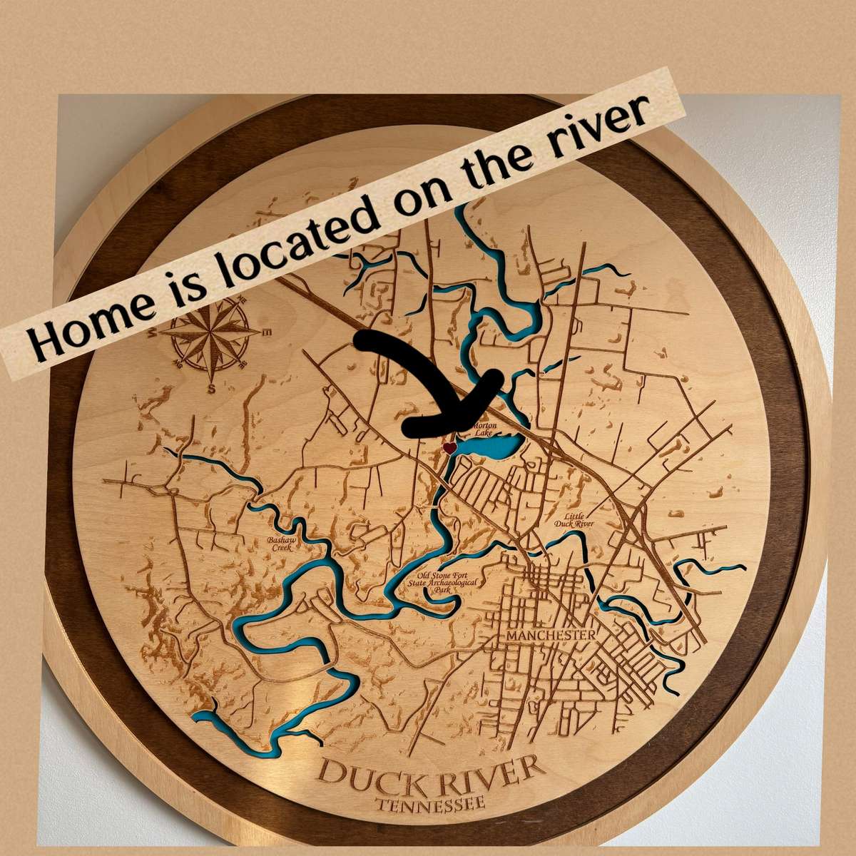 Enjoy seeing the location of your home on this wooden cut-out of the river.