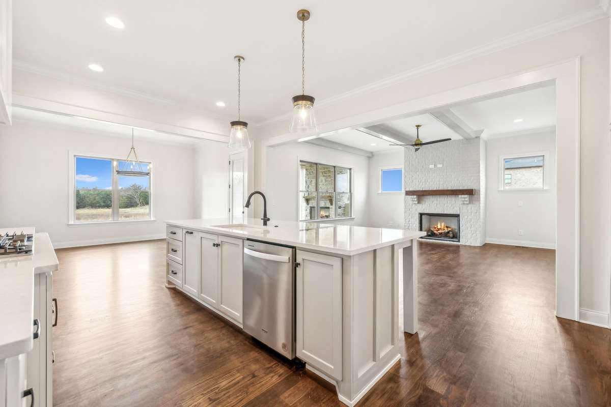 Kitchen opens to dining room and living room
