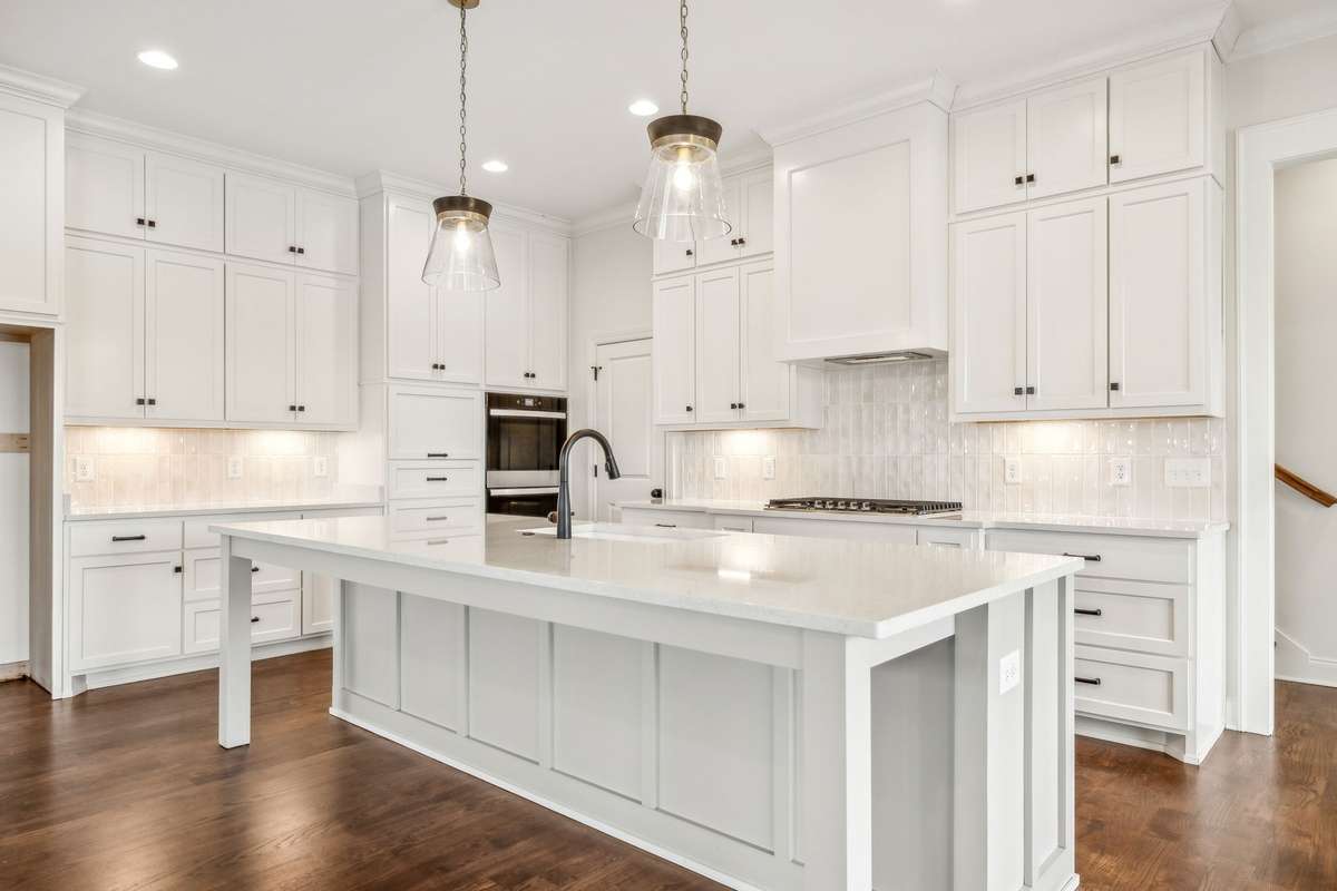 Home features stunning kitchen with oversized island!
