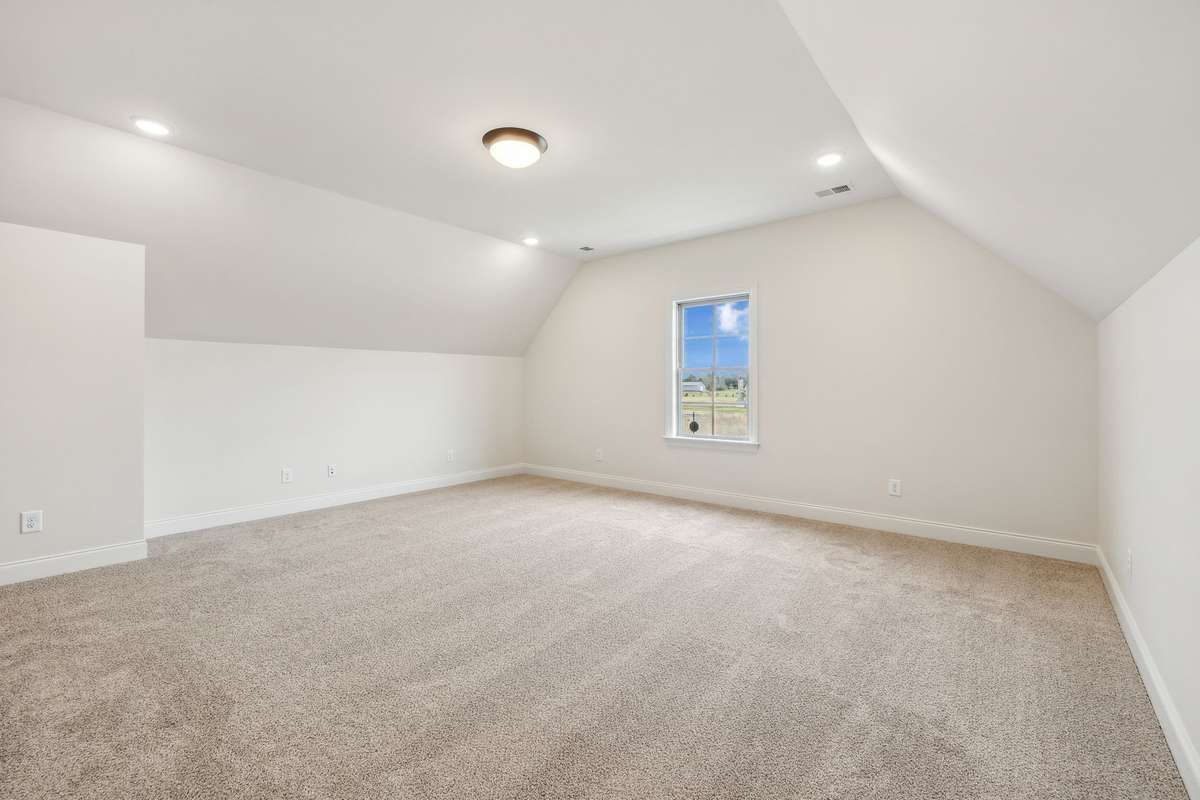 Bedroom 3 is located upstairs