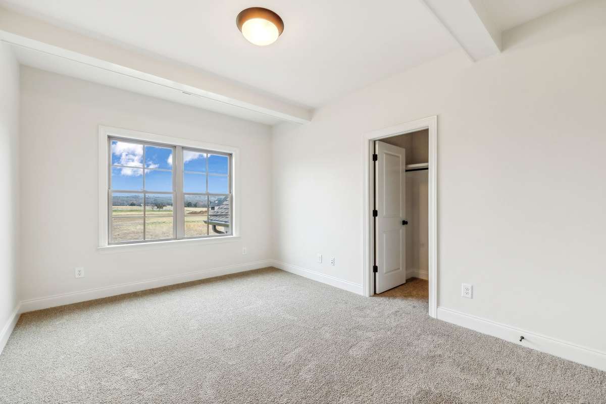 Bedroom 4 is located upstairs
