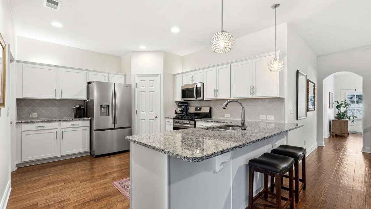 Kitchen with Frigidaire gallery gas stove and microwave, Bosch dishwasher.