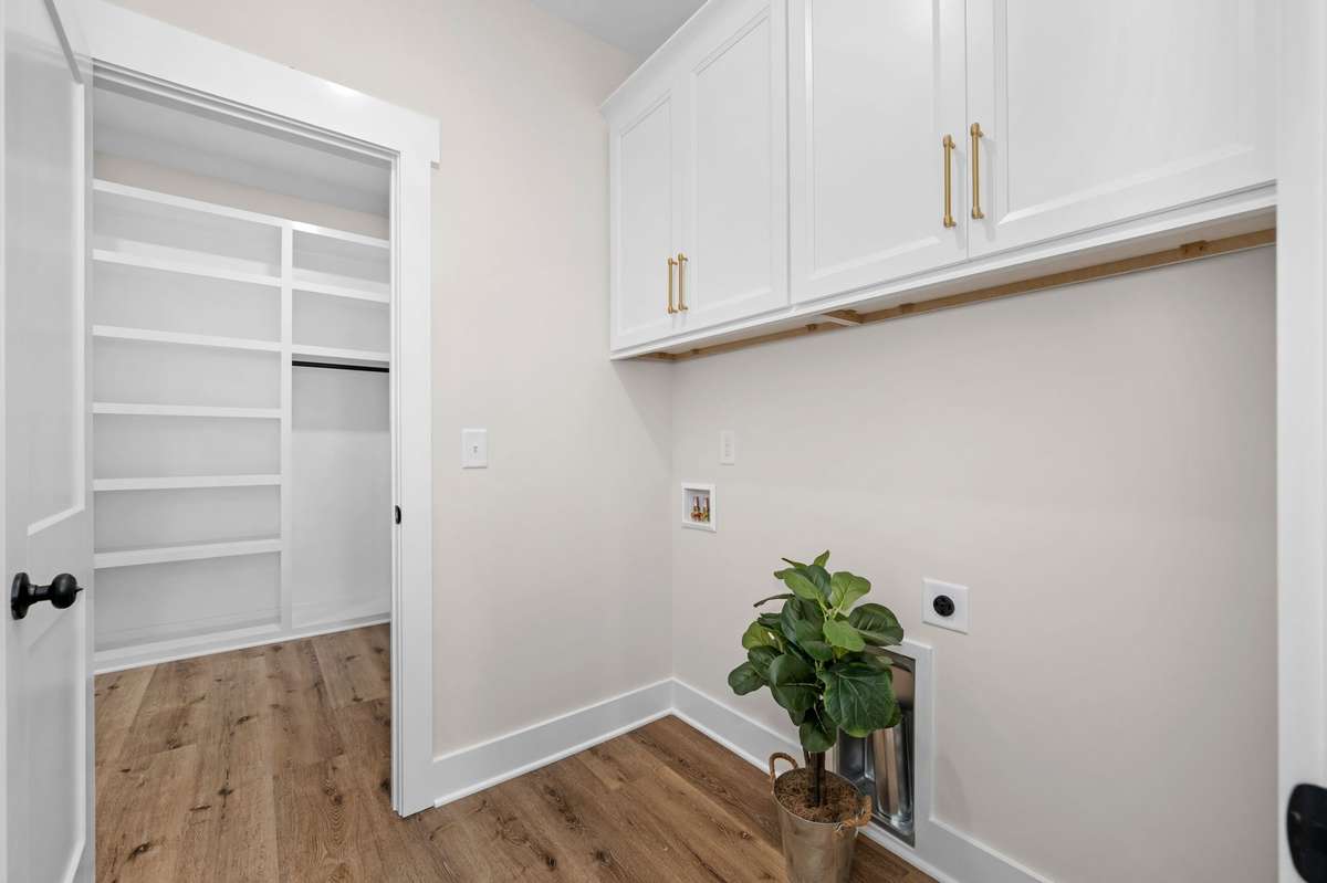 Direct access to laundry room from Primary closet.