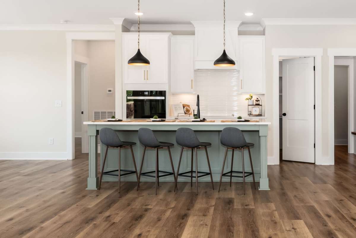 Stunning kitchen with walk-in pantry is a real show-stopper!