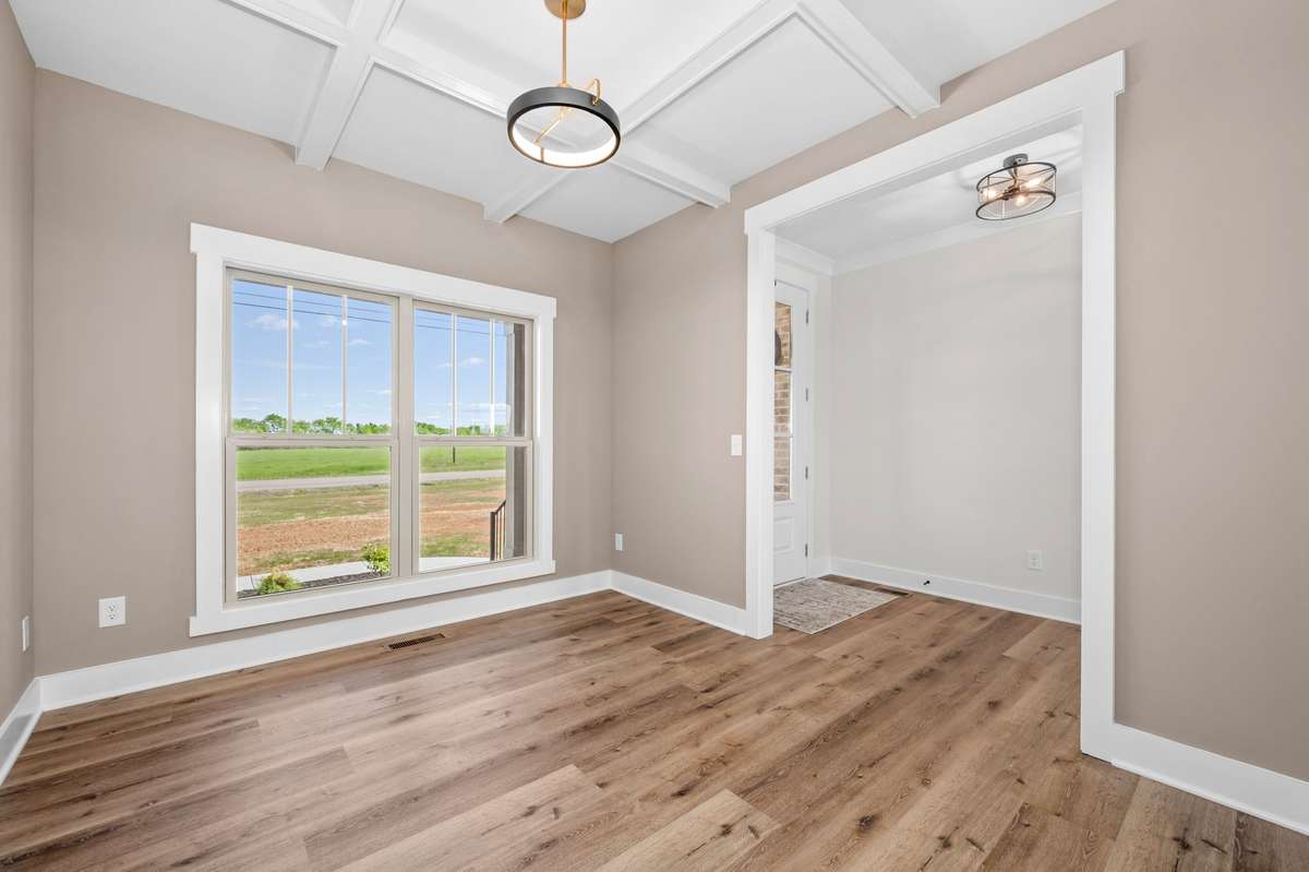 The Coffered ceiling in the dining room/office is one of many special touches inside this home.