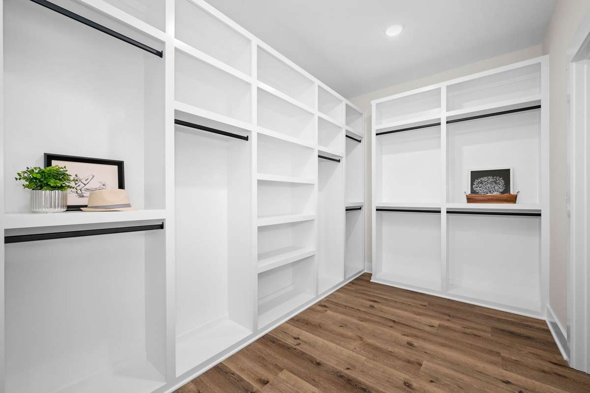 Custom shelving in Primary closet.