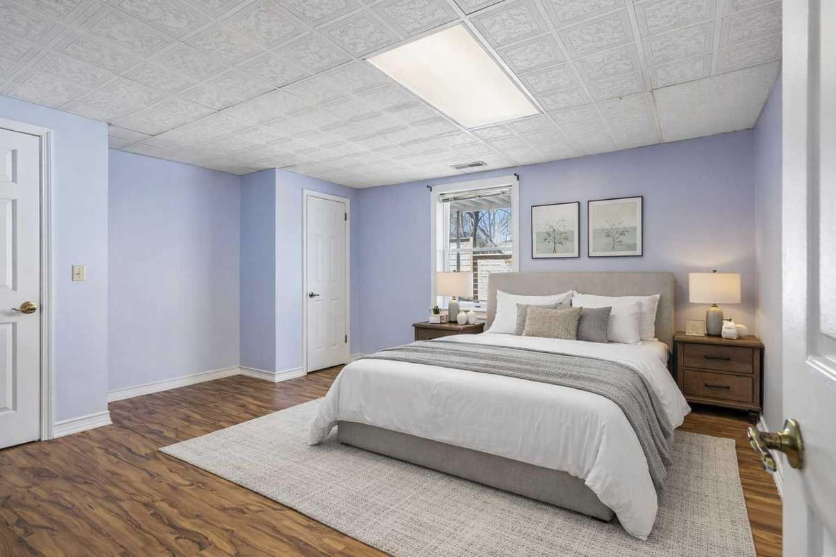 Guest Bedroom 3 on the Basement Level 

Photo has been virtually enhanced/staged for marketing purposes