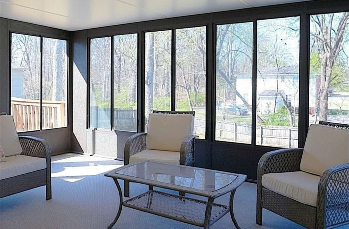 Sunroom off of the Dining Room 

Photo has been virtually enhanced for marketing purposes