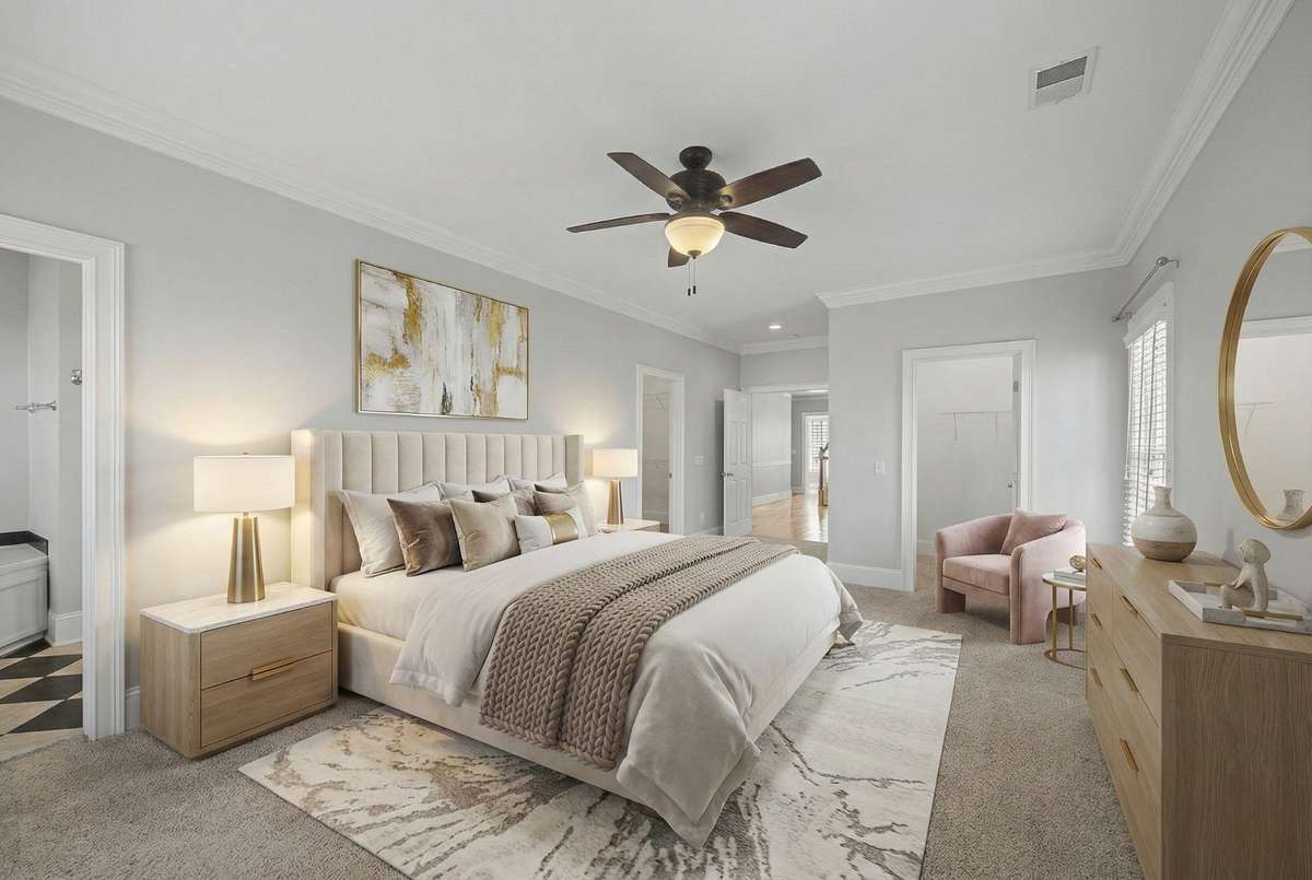 Primary Bedroom: Generous primary suite with large windows and plush neutral carpeting