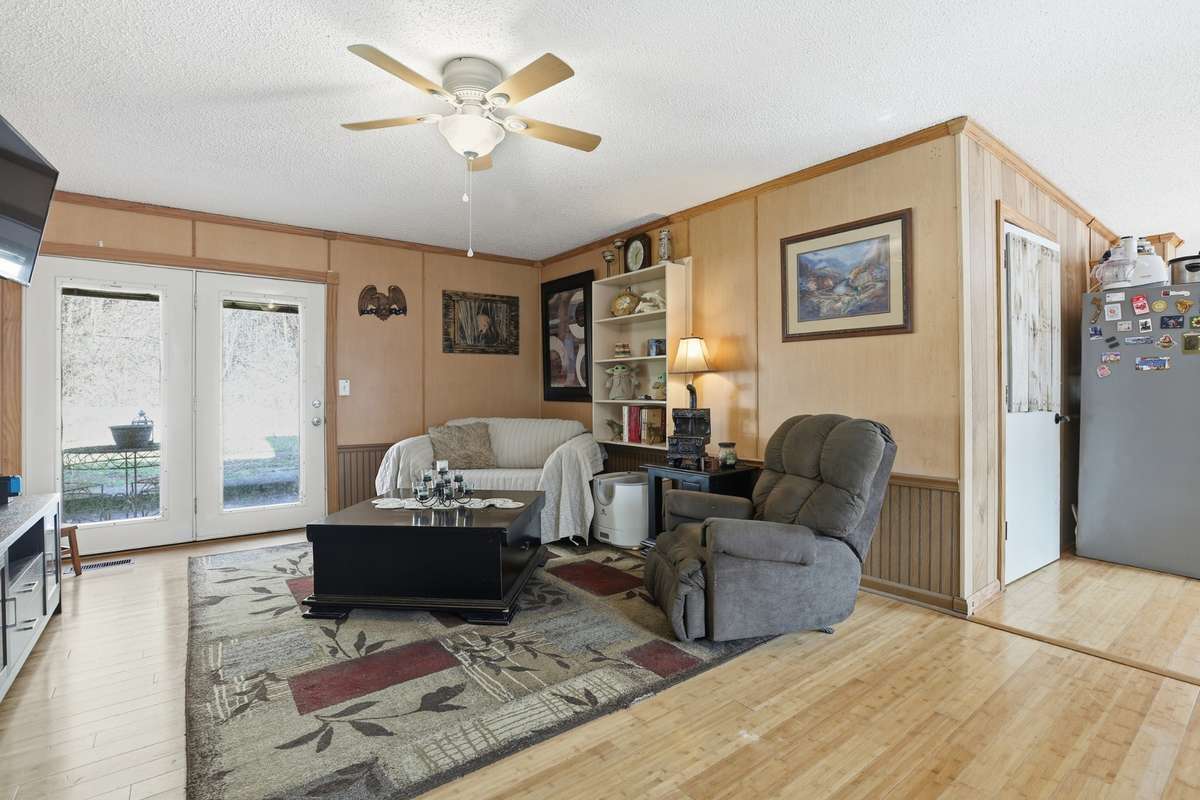 Living room with french doors leading to the patio.