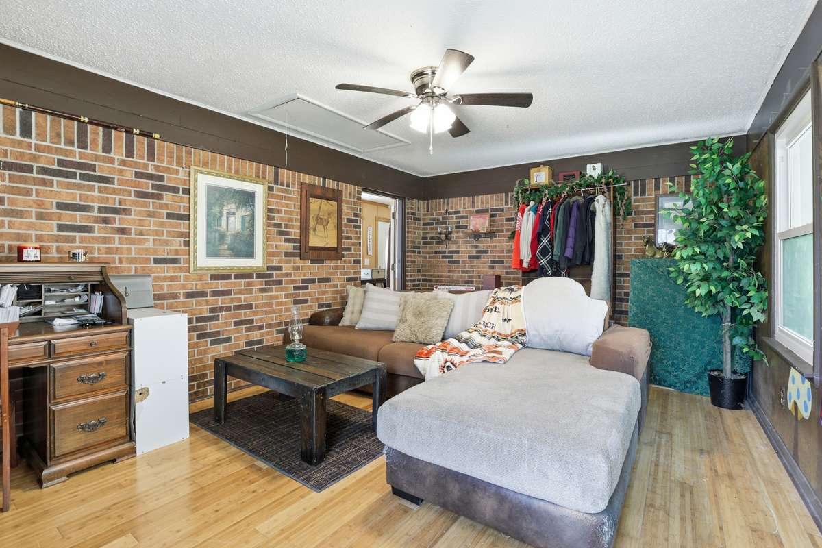 A large Den is located off the Kitchen area for relaxing family gatherings.