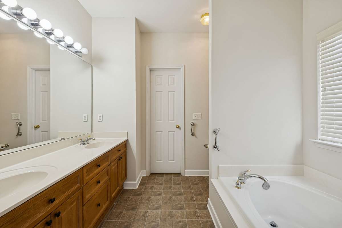 Spacious master bathroom with separate tub and shower. Huge walk-in closet!