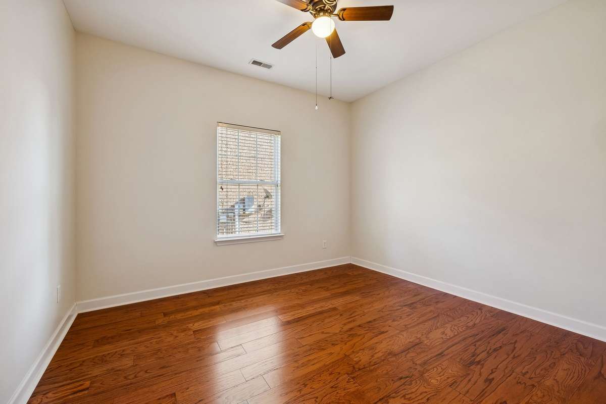 One of two additional bedrooms downstairs.