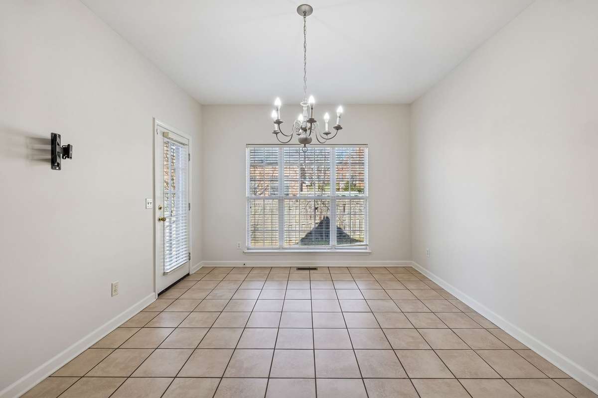 Eat-in area just off the kitchen - easy access to the backyard too!