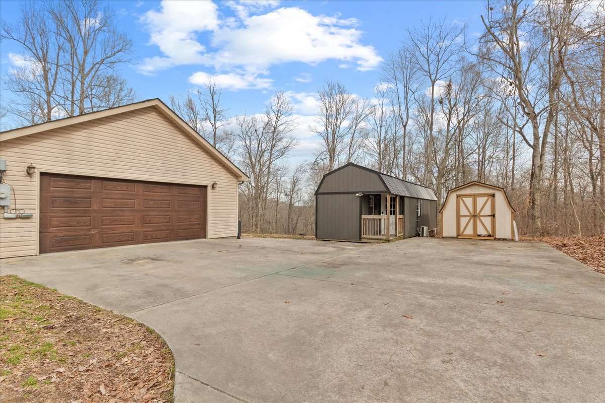 Mother in Law Suite or Mancave plus an extra storage shed.