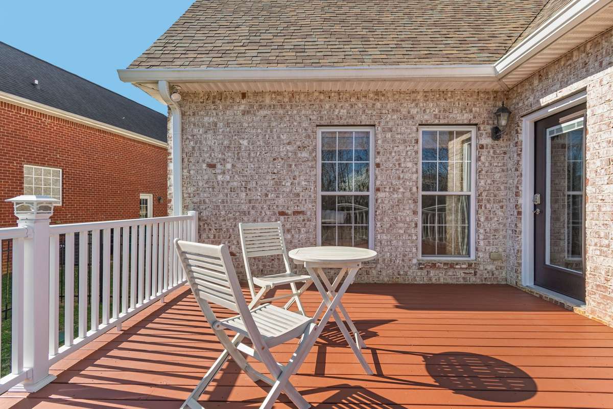 The deck provides ample space for outdoor seating, dining, and entertaining.