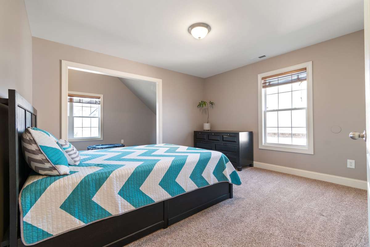 A spacious bonus room that could easily function as an additional bedroom.