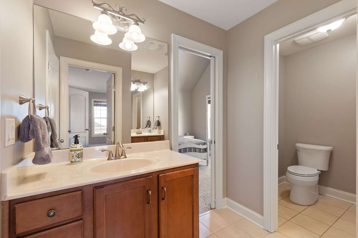 Convenient Jack-and-Jill bathroom with dual access.