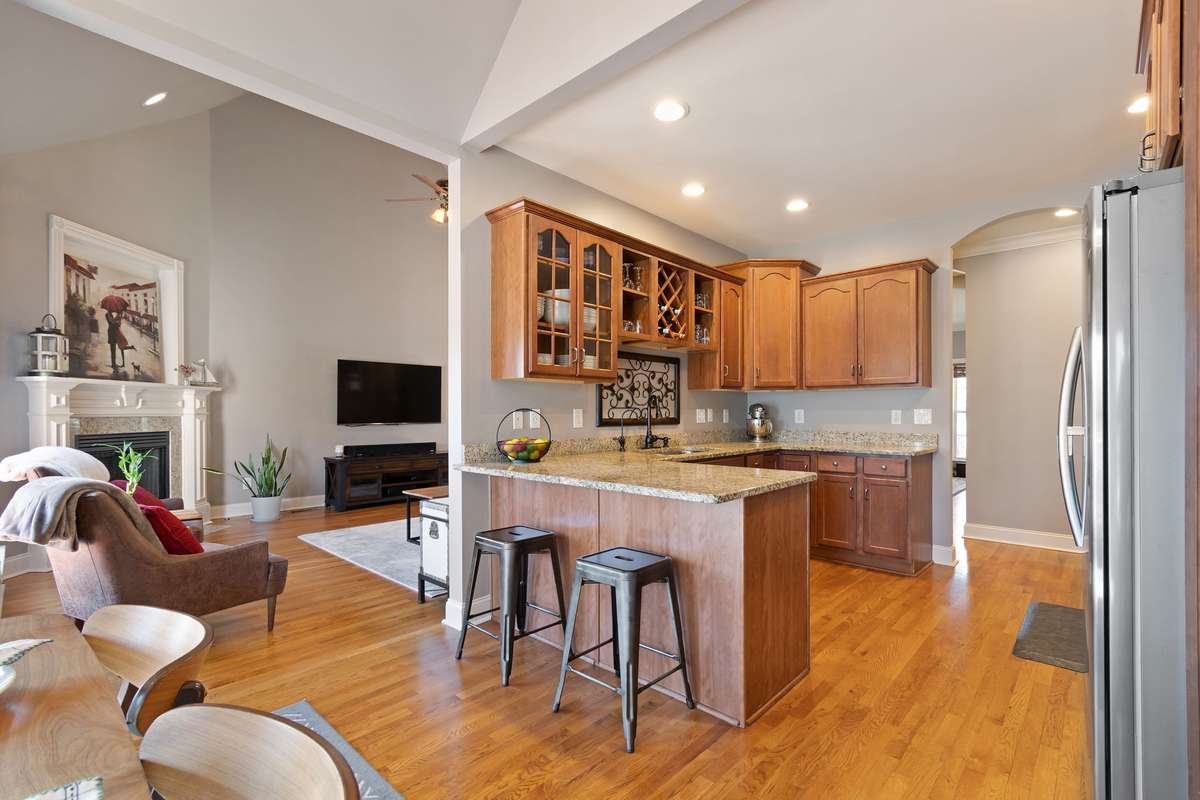 Granite countertops extend throughout the kitchen.