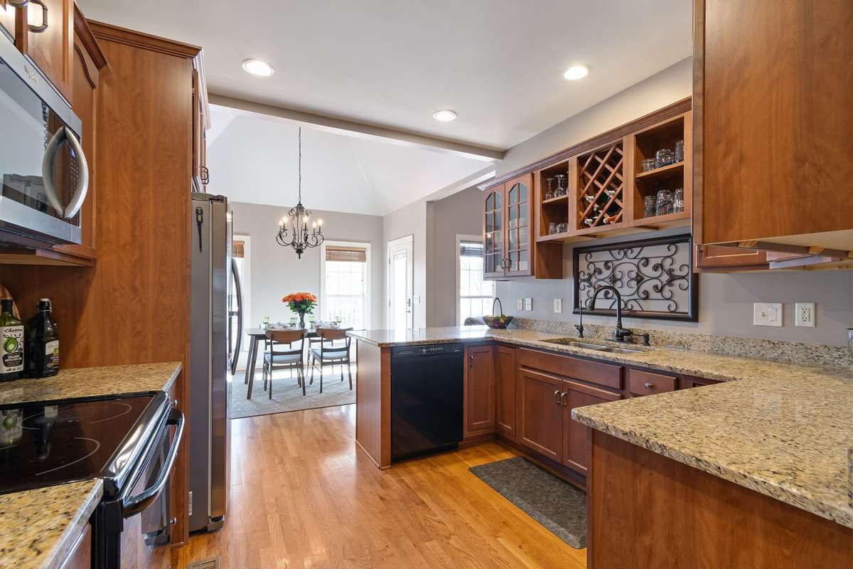 The kitchen opens directly to the dining area, creating an ideal setup for hosting and daily use.