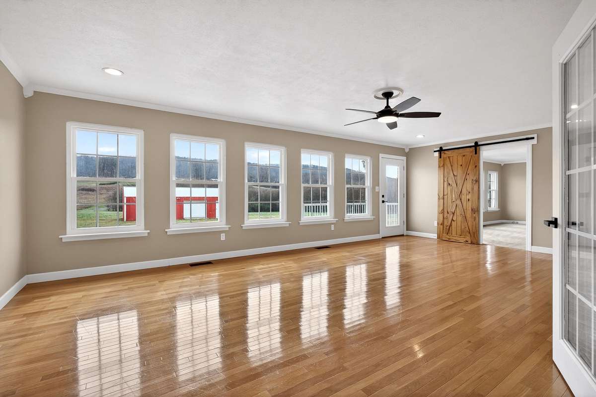 Florida Room with beautiful hardwood flooring!