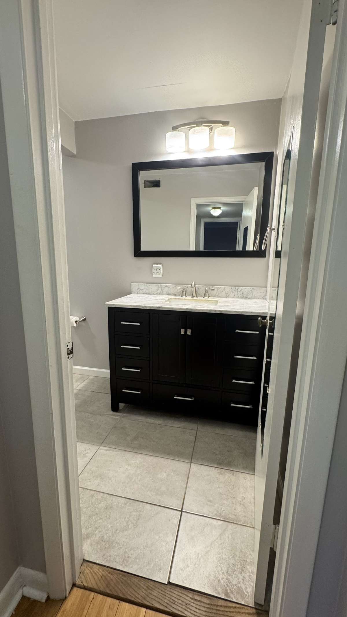 The rich shades of the vanity and the mirror are wonderful.