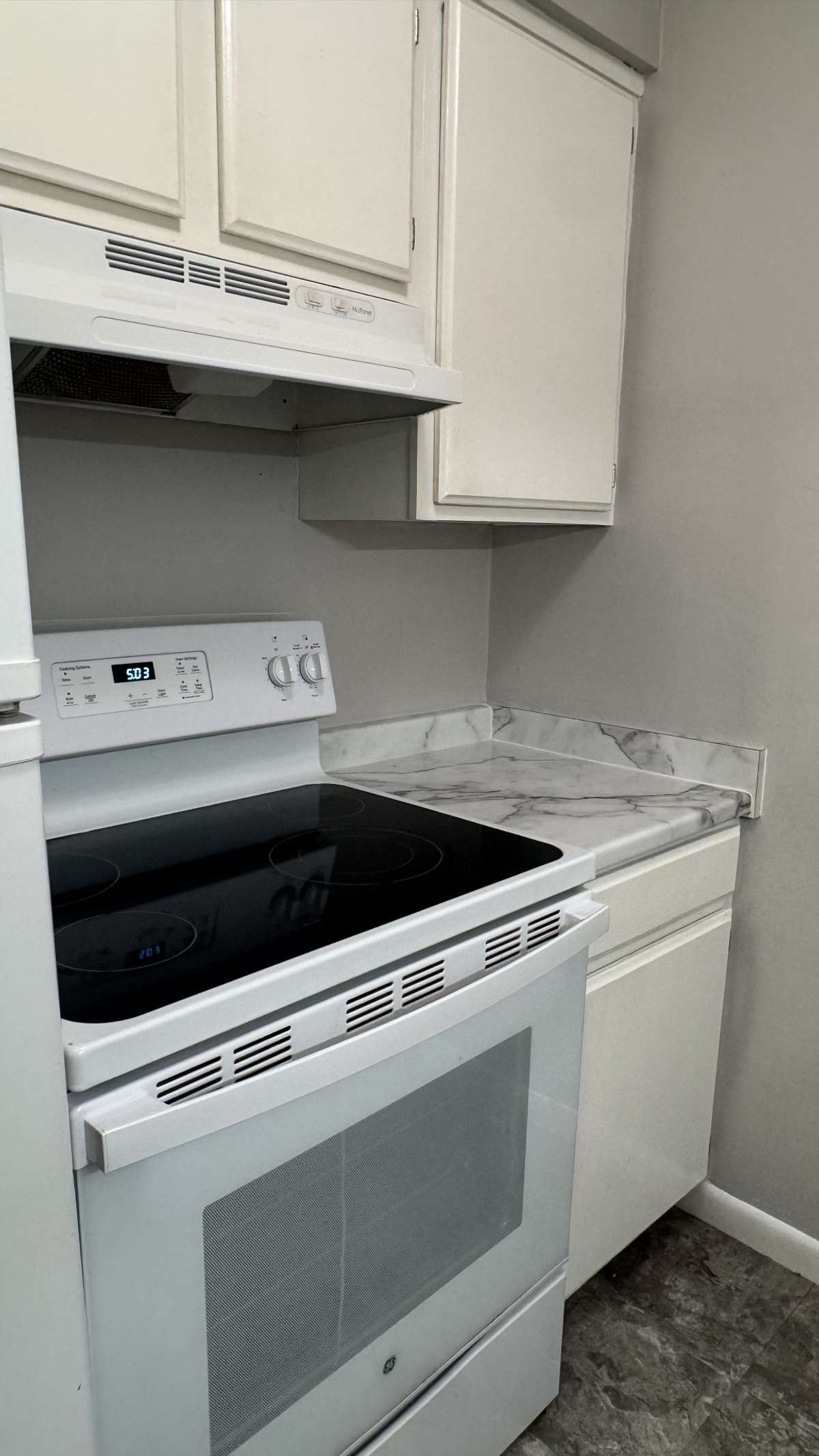 The range, with its glass cooktop, makes for easy cleanup and use.