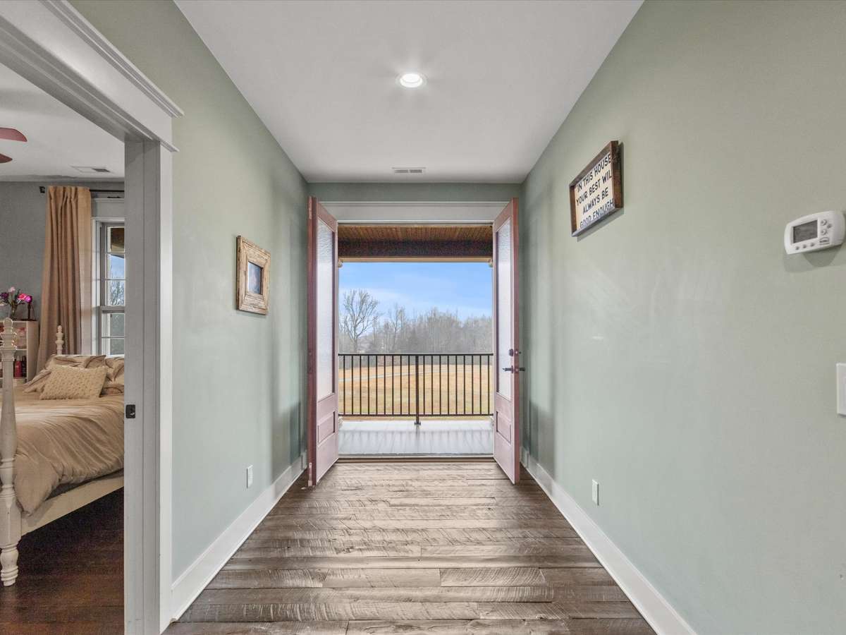 Upstairs Foyer headed out to balcony