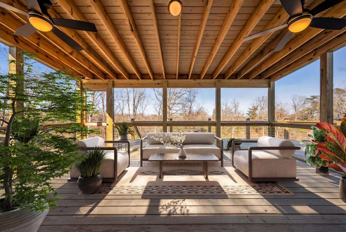 Virtually staged, massive screened-in and covered deck.