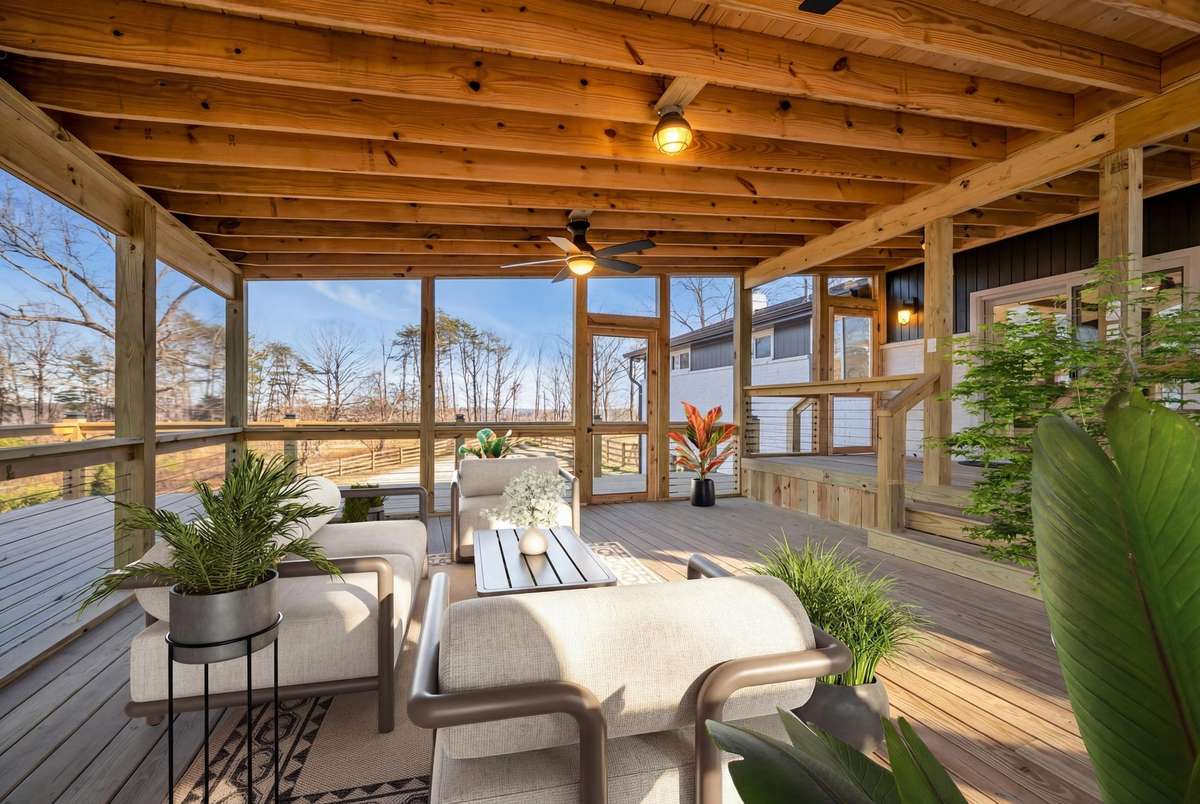 Virtually staged, massive screened-in and covered deck.
