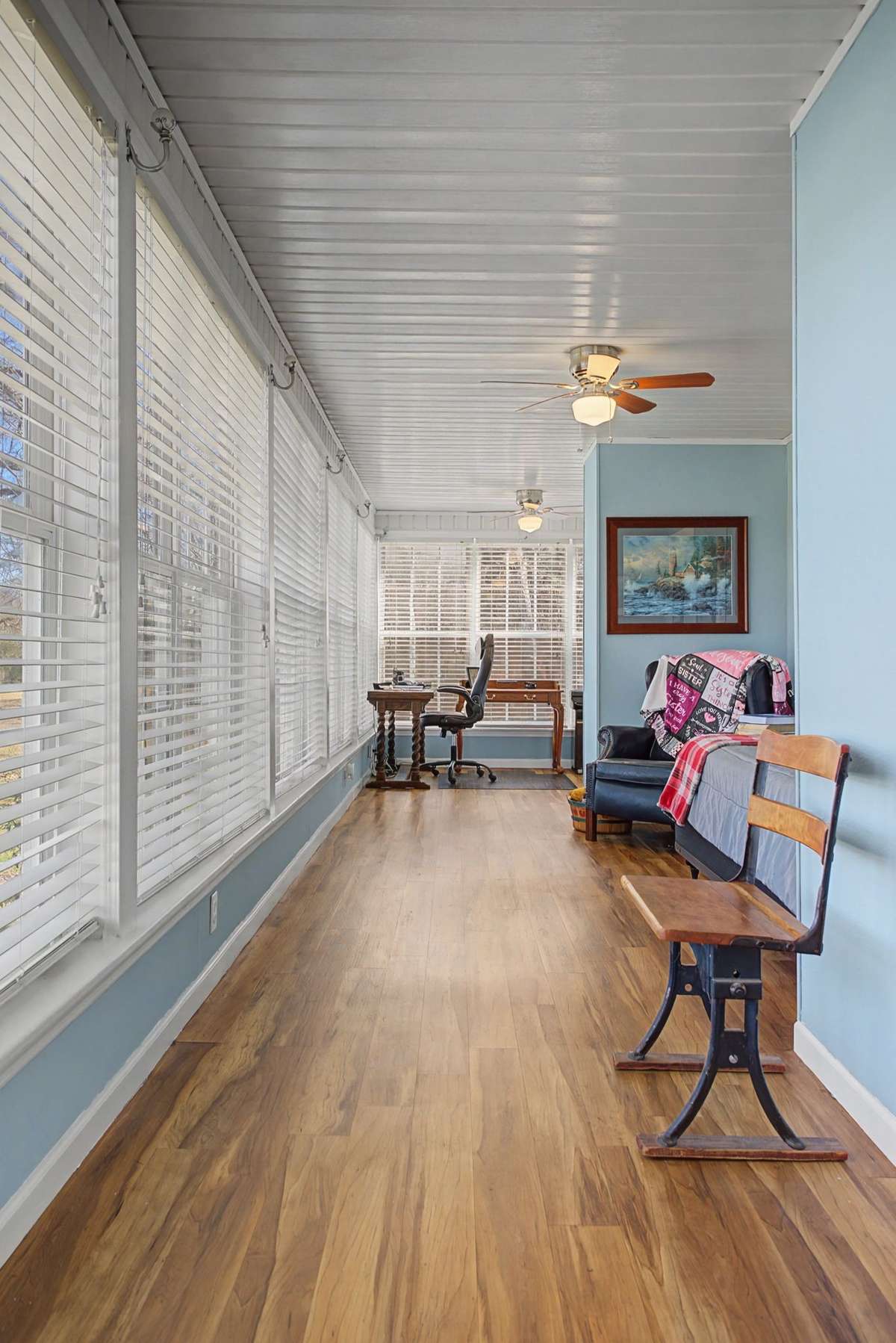 Sunroom with wall of windows