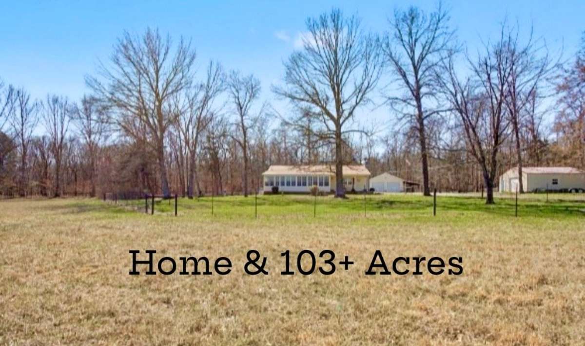 Beautiful Farmhouse located in Lewisburg TN on 103+level acres. Detached two car garage, separate large workshop and lots of privacy.