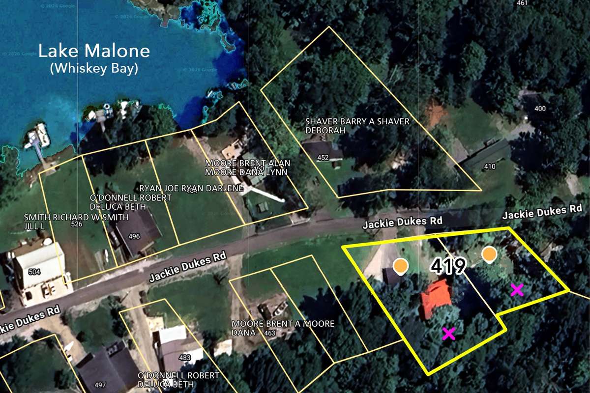 419 Jackie Dukes is comprised of 2 lake view lots overlooking popular Whiskey Bay on Lake Malone.