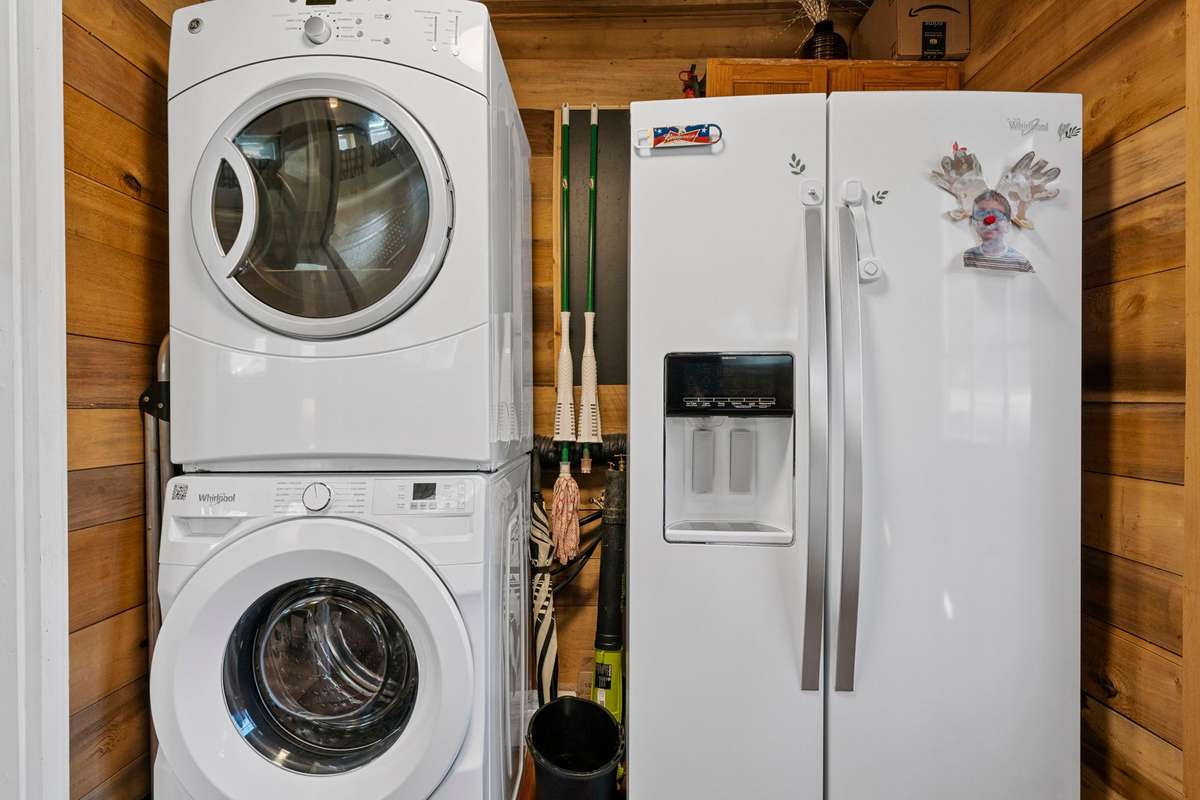 Laundry Room: Washer/Dryer, 2nd Refrigerator w/water dispenser to remain.
