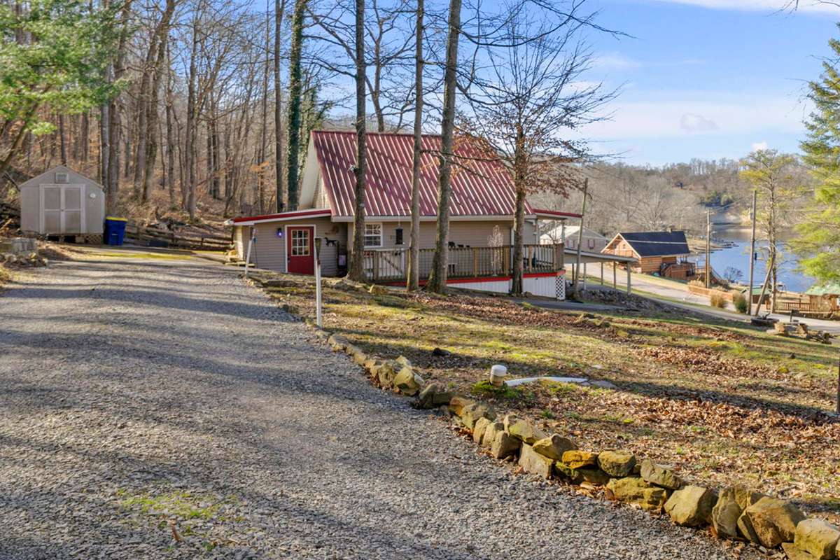 Second lot has established driveways, water, electric & septic - perfect for adding home/rental!
