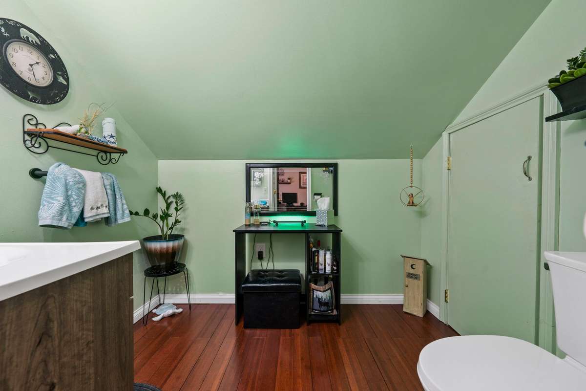 Upstairs half bath.