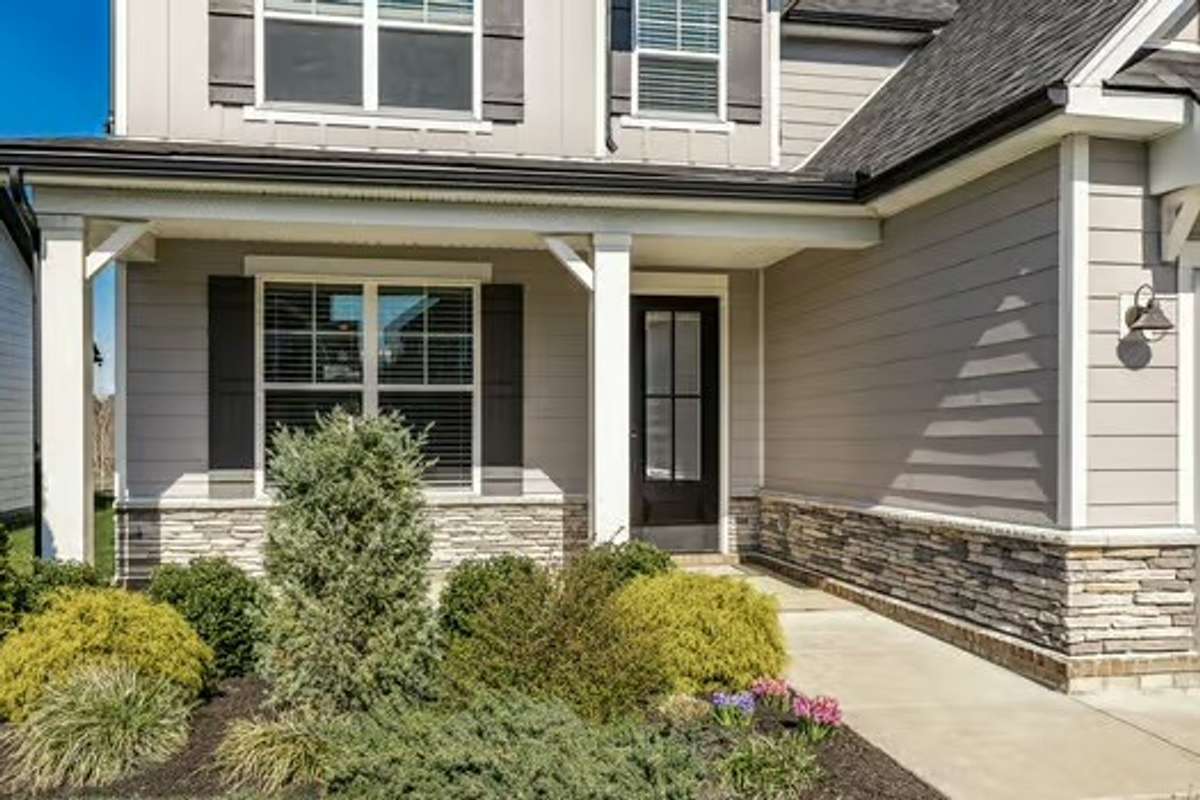 Beautifully landscaped front and backyard with premium lake viewing
