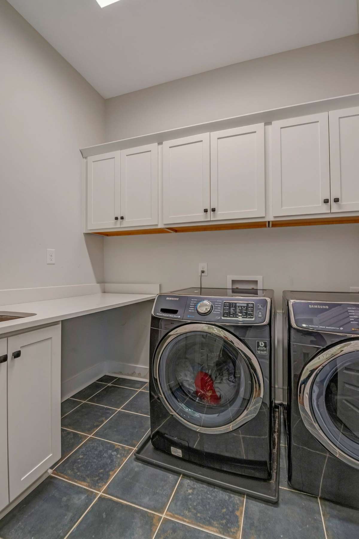Sink in Laundry and extra cabinets