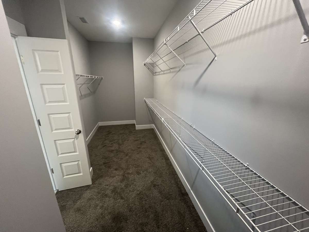 primary bedroom's massive walk in closet