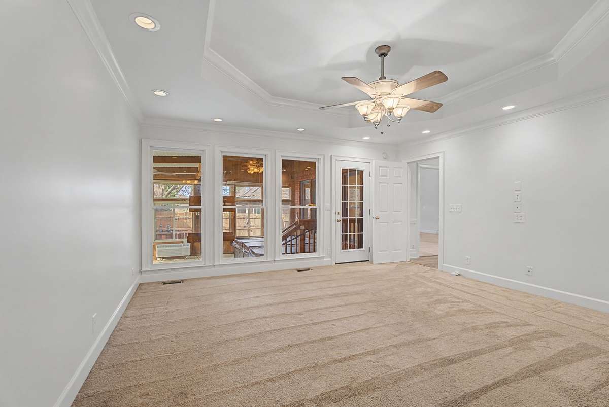 Another view of the primary bedroom.
