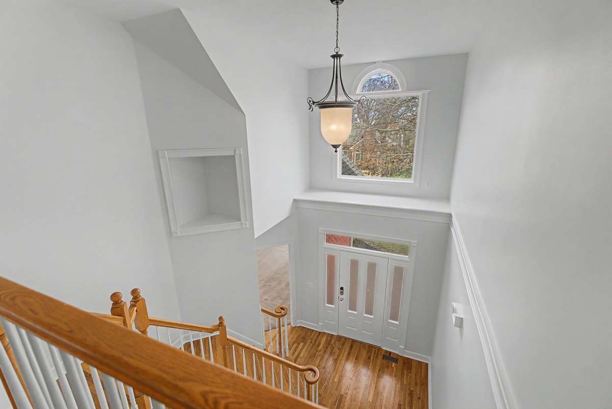 View from the loft. There is a light to accent the built in display area on the stairwell. It wasn't turned on during the photo shoot.