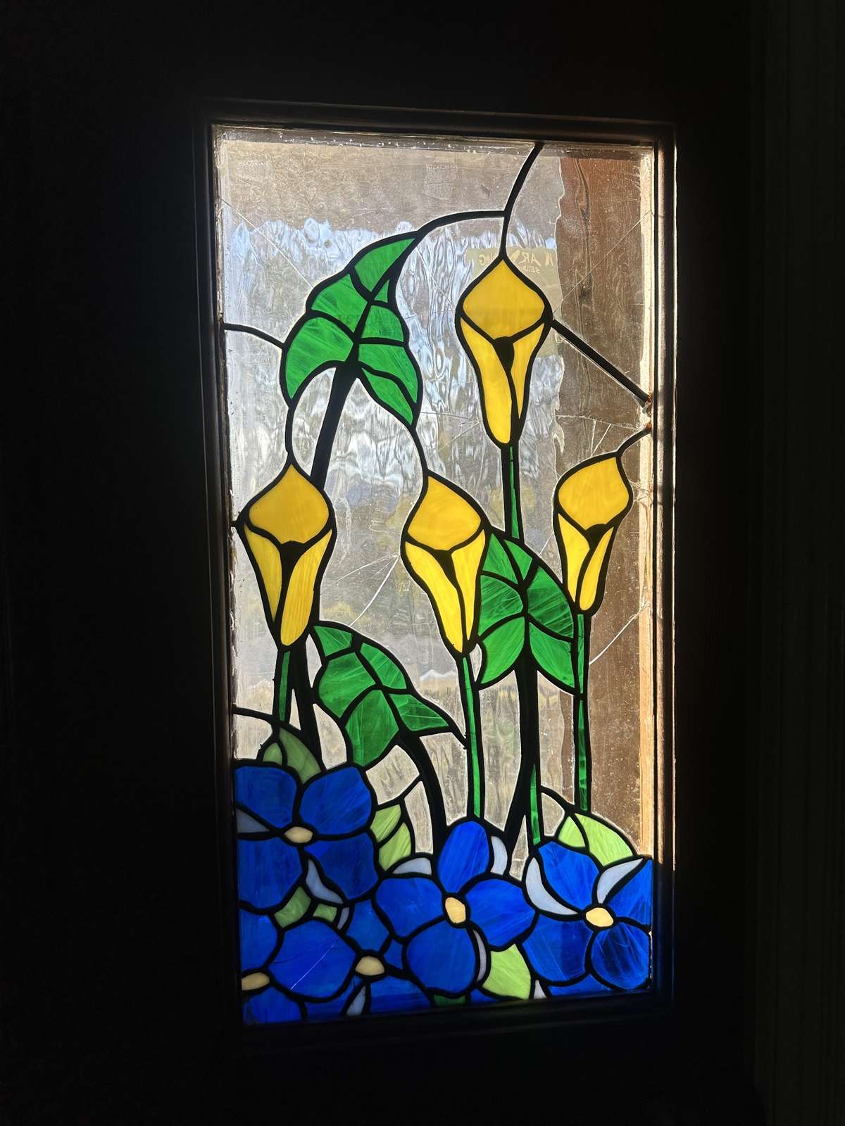 Pretty stained glass detail on the front door