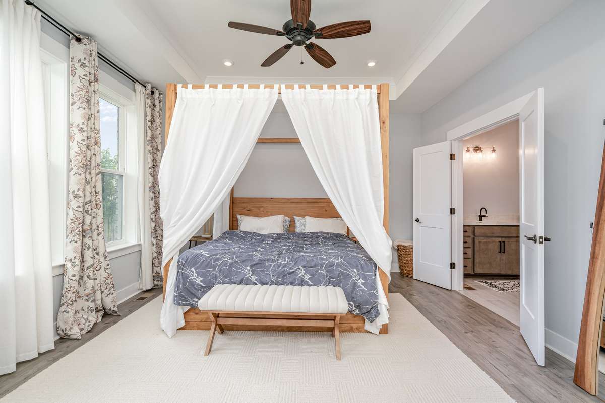 True main-level living at its finest; a spacious primary retreat conveniently located on the first floor.
