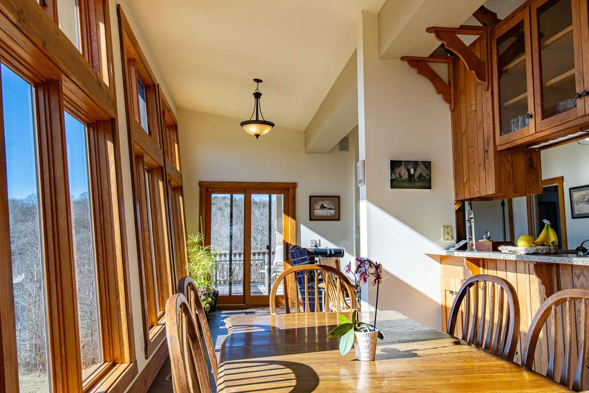 Dining Area next to Kitchen, with view over the hills