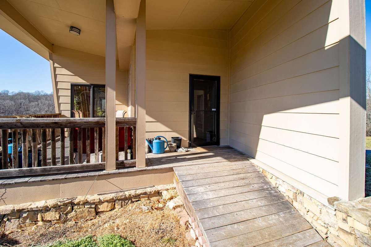 Side Covered Porch, which leads to a mud room