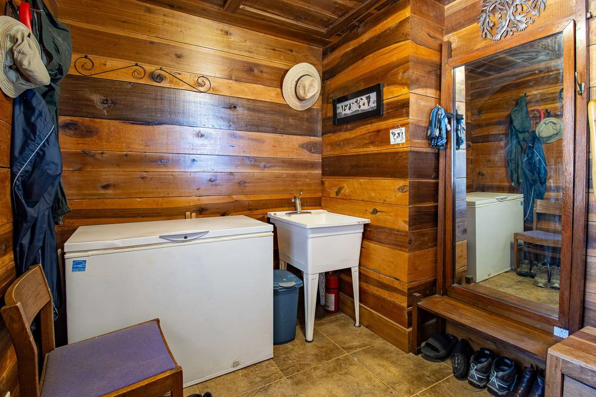Mud Room, with freezer and sink.